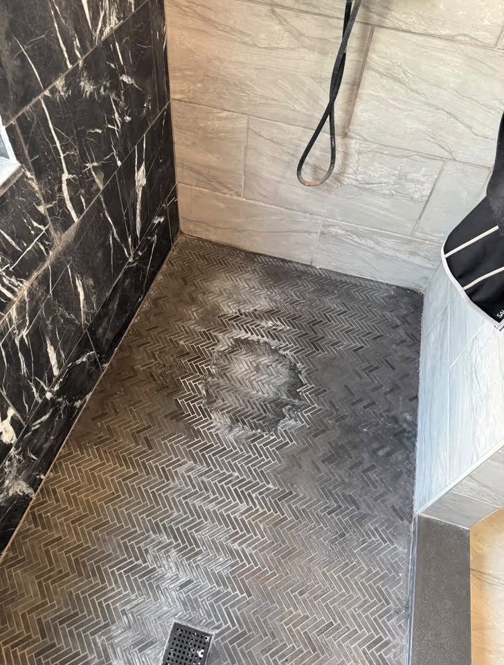 Shower floor before cleaning